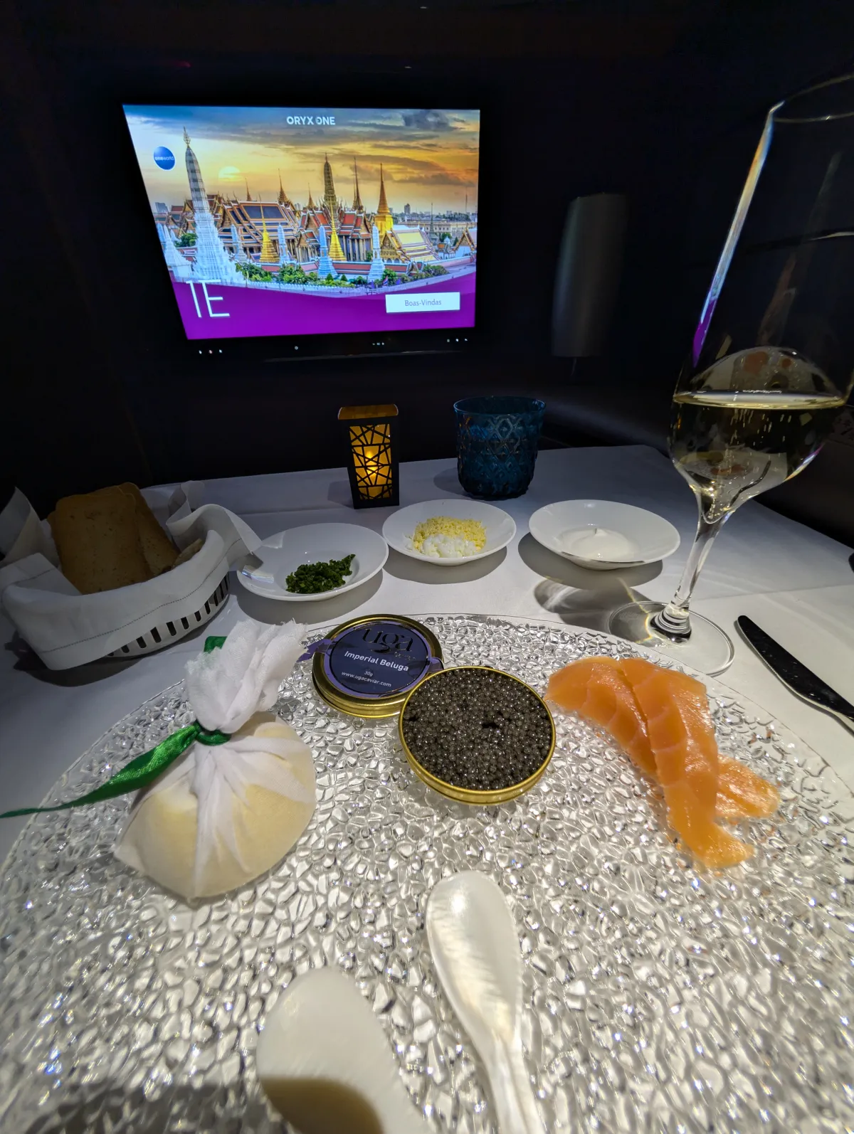 Qatar Airways First Class Beluga caviar service with salmon and champagne