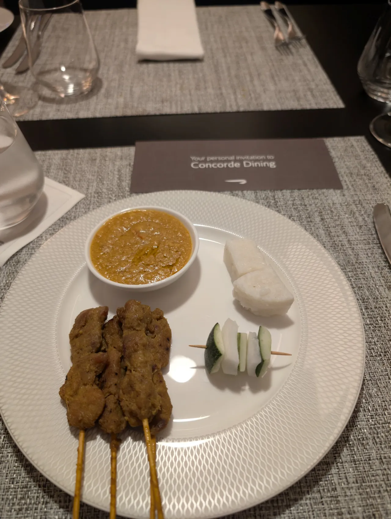 Chicken satay skewers with peanut sauce and ketupat at British Airways Concorde Dining, Changi Terminal 1